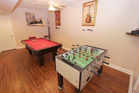 Game Room with Pool and Foosball Tables