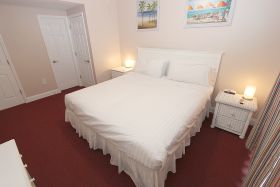 Bedroom 3, upstairs on left, pool side, balcony, En-Suite