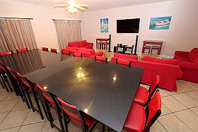 Living area showing kitchen in background